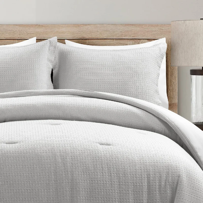 Microfiber - filled comforters that are lightweight and easy to care forHaniya Solid Waffle Woven Cotton Textured Comforter Set